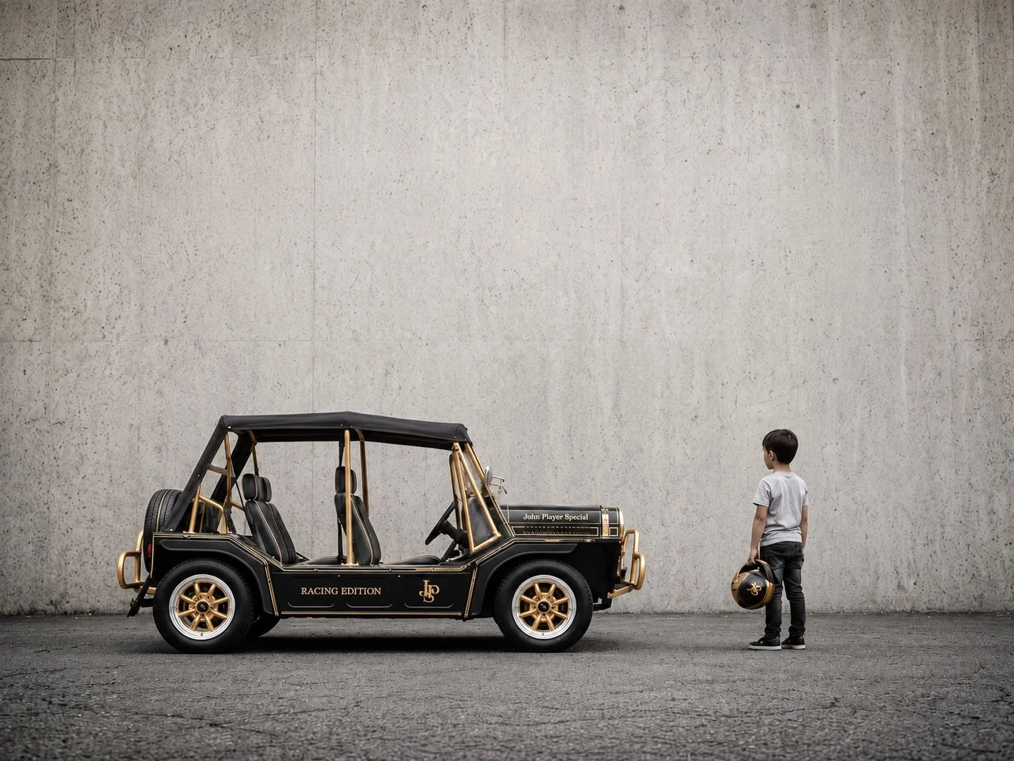 A child standing beside a black and gold ÉLAN